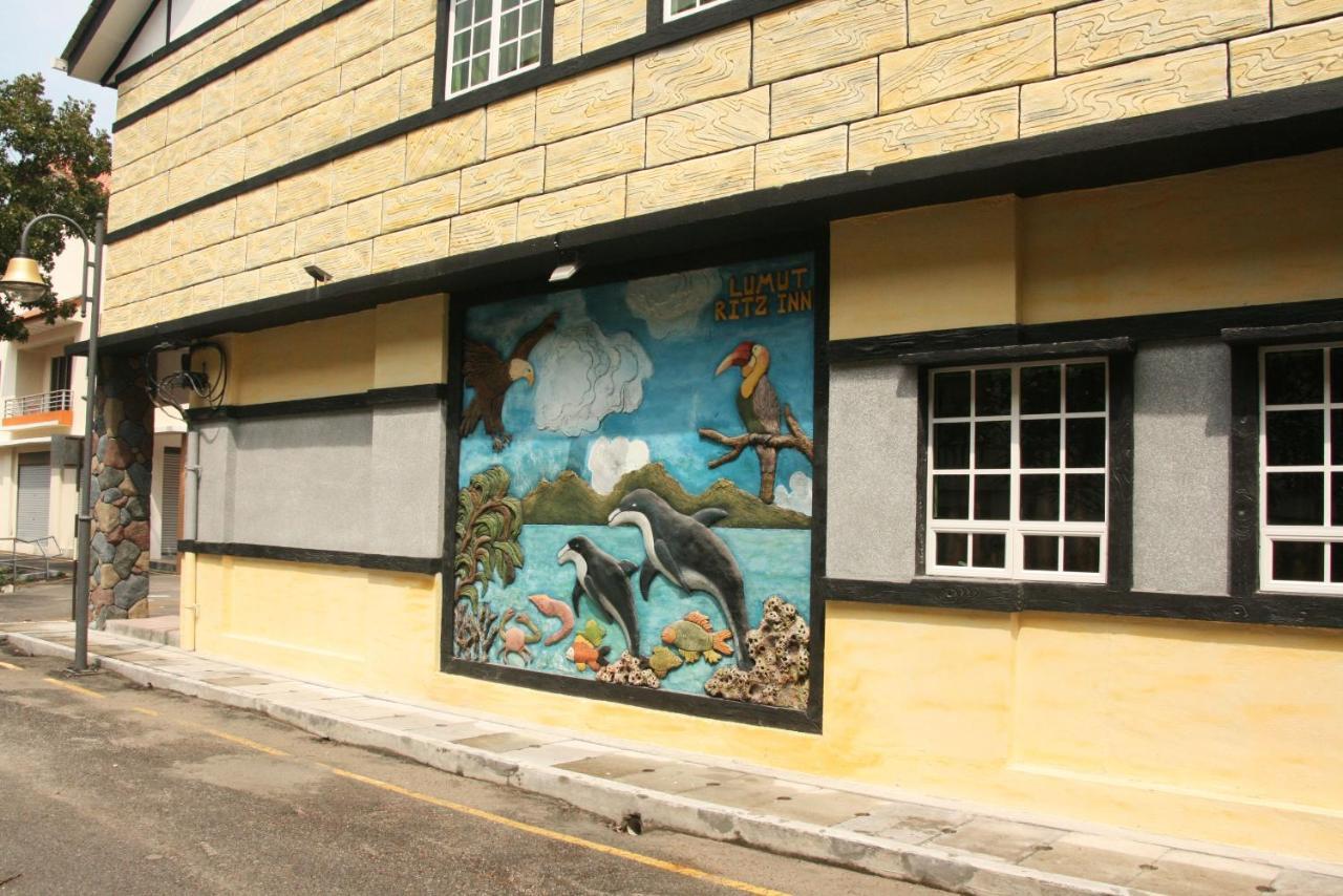 Lumut Suites Buitenkant foto
