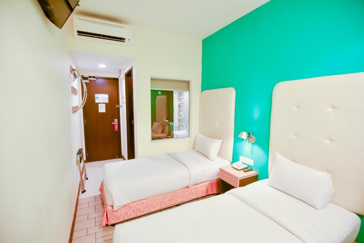 Lumut Suites Buitenkant foto