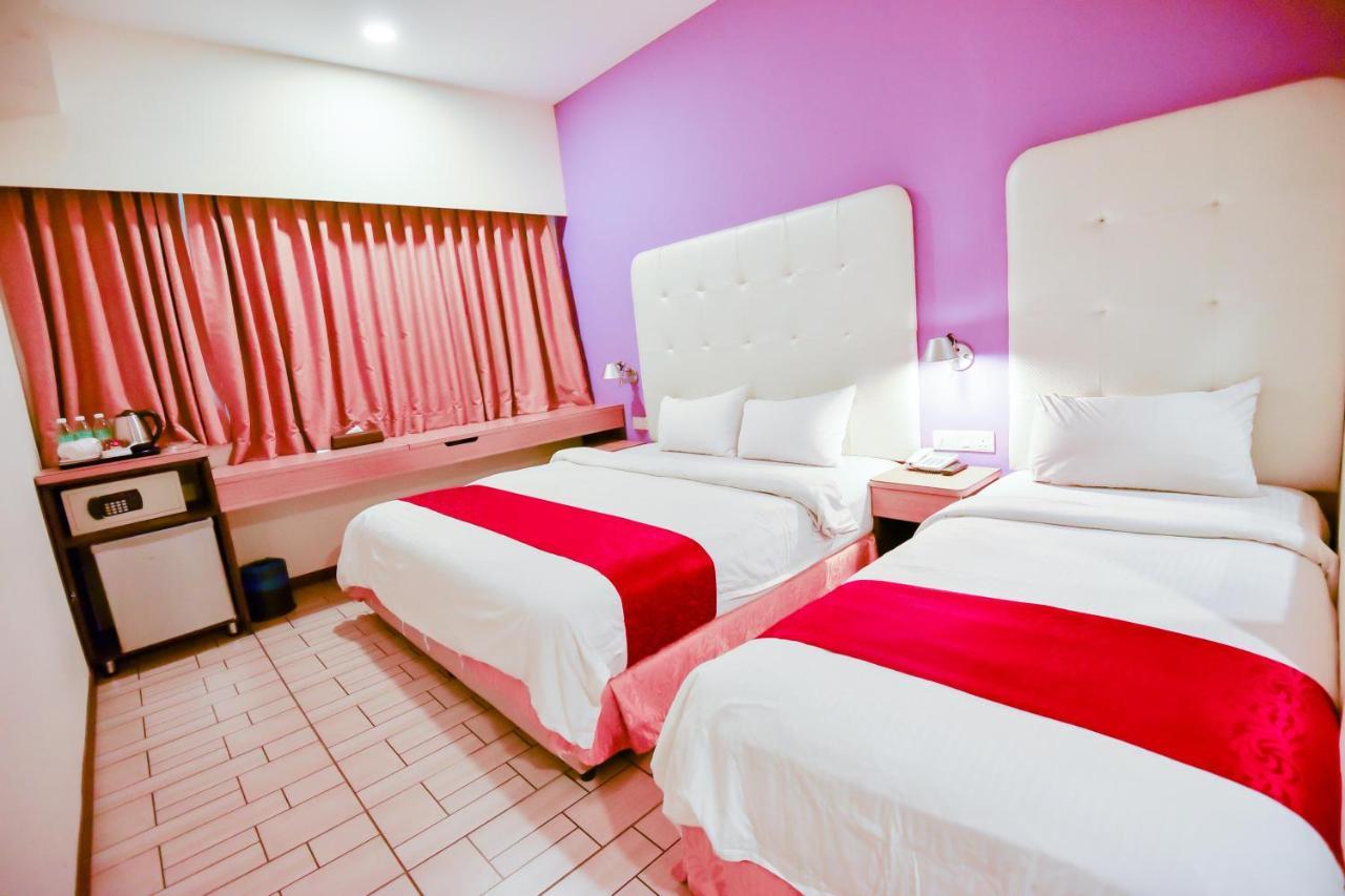 Lumut Suites Buitenkant foto